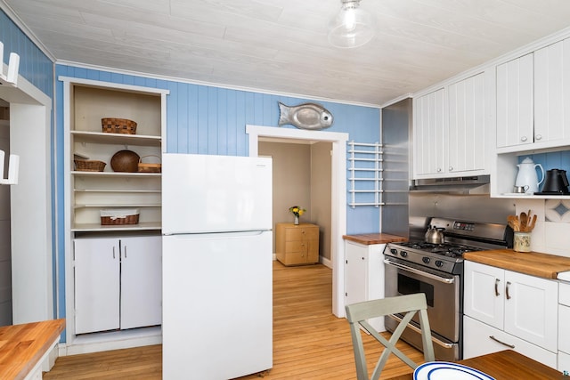 244 E 3rd St, Knife River, MN 55609 - kitchen with freestanding refrigerator, butcher block counters, gas stove, open shelves, and under cabinet range hood