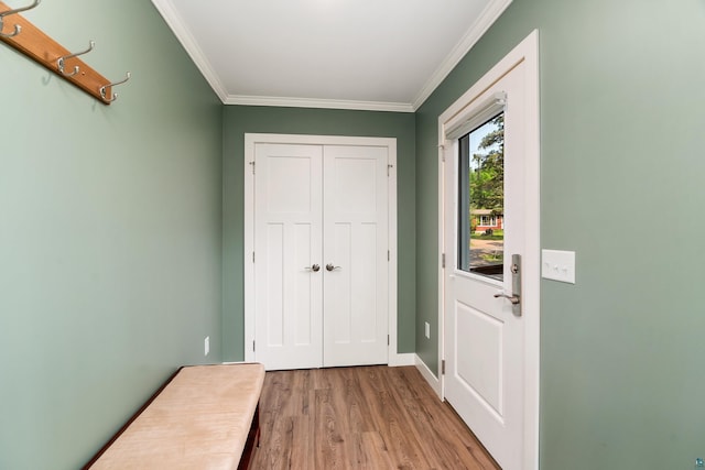 244 E 3rd St, Knife River, MN 55609 - foyer featuring ornamental molding, wood finished floors, and baseboards
