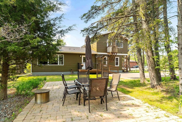 244 E 3rd St, Knife River, MN 55609 - view of patio with outdoor dining space and a deck