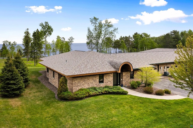 8357 Congdon Blvd Unit 7, Duluth, MN 55804 - ranch-style house featuring a front lawn, brick siding, and roof with shingles