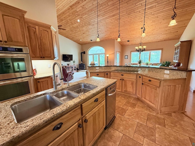 20 Mulberry Ln, Babbitt, MN 55731 - kitchen with stainless steel double oven, wood ceiling, vaulted ceiling, a sink, and light stone counters