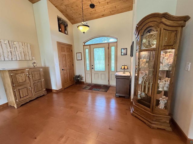 20 Mulberry Ln, Babbitt, MN 55731 - entrance foyer featuring wood finished floors, high vaulted ceiling, wooden ceiling, and baseboards