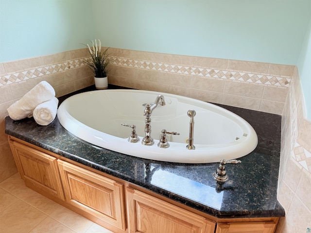 20 Mulberry Ln, Babbitt, MN 55731 - bathroom featuring a bath and tile patterned floors