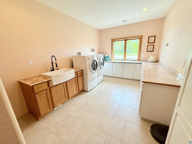 20 Mulberry Ln, Babbitt, MN 55731 - washroom with washer and dryer, cabinet space, light tile patterned flooring, and recessed lighting