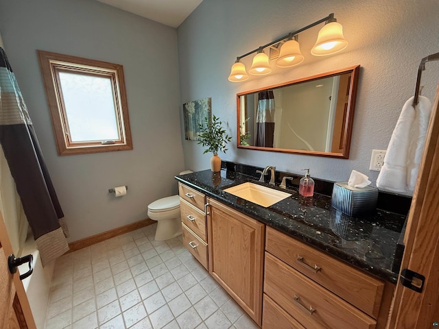 20 Mulberry Ln, Babbitt, MN 55731 - full bathroom with vanity, baseboards, toilet, and a shower with curtain