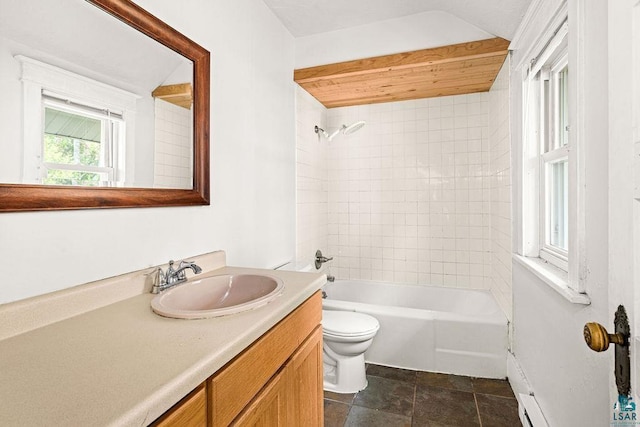 1901 E 5th St, Duluth, MN 55812 - full bathroom with toilet, vanity,  shower combination, and stone finish floors