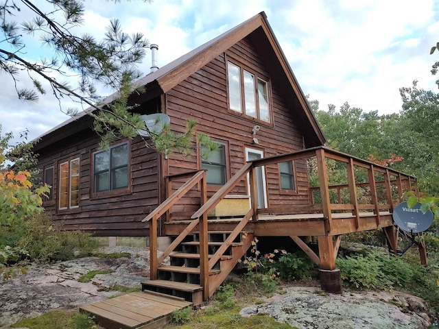 4089 First Lake Rd, Ely, MN 55731 - back of house featuring a deck