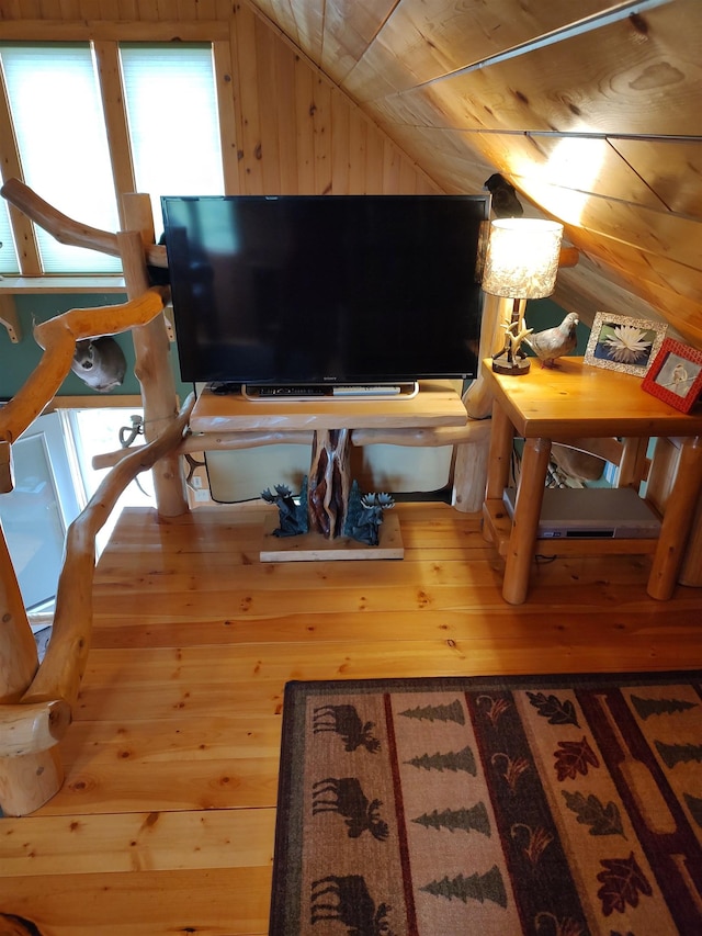 4089 First Lake Rd, Ely, MN 55731 - living area with vaulted ceiling, hardwood / wood-style floors, wood ceiling, and wood walls