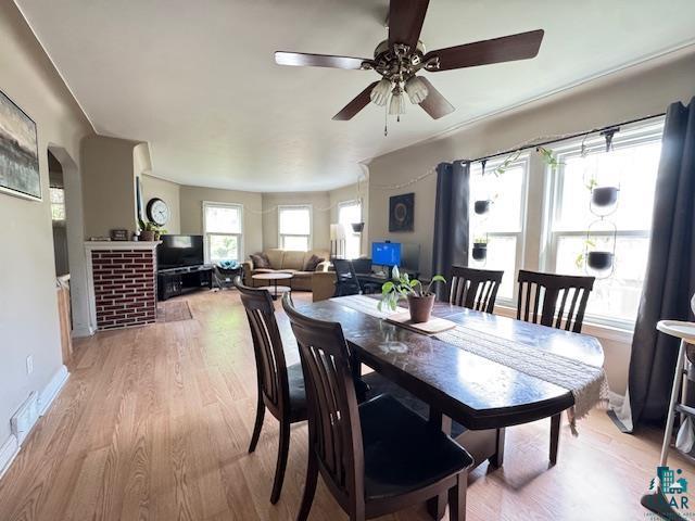 17 S 57th Ave E, Duluth, MN 55804 - dining area featuring a ceiling fan, light wood finished floors, and baseboards