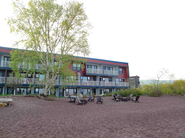 21 E Wisconsin St Unit 302, Grand Marais, MN 55604 - view of apartment building / complex with a fire pit