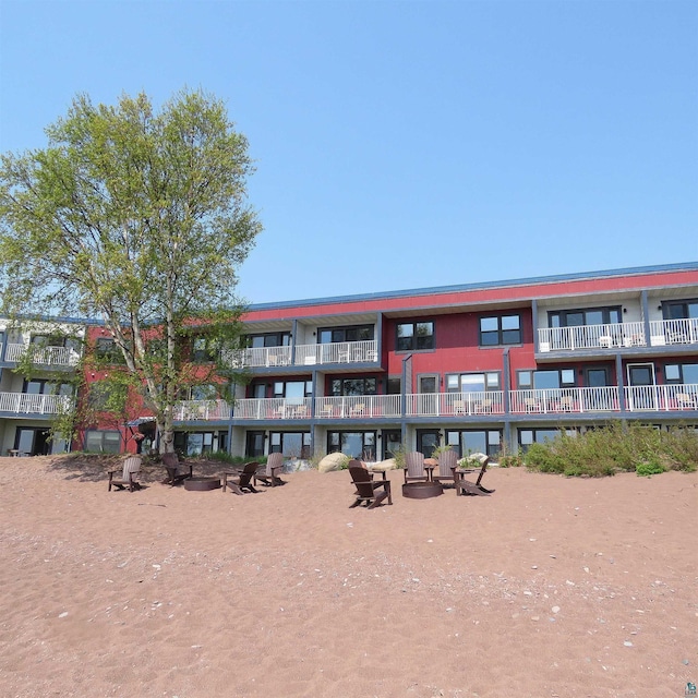 21 E Wisconsin St Unit 302, Grand Marais, MN 55604 - view of apartment building / complex featuring an outdoor fire pit