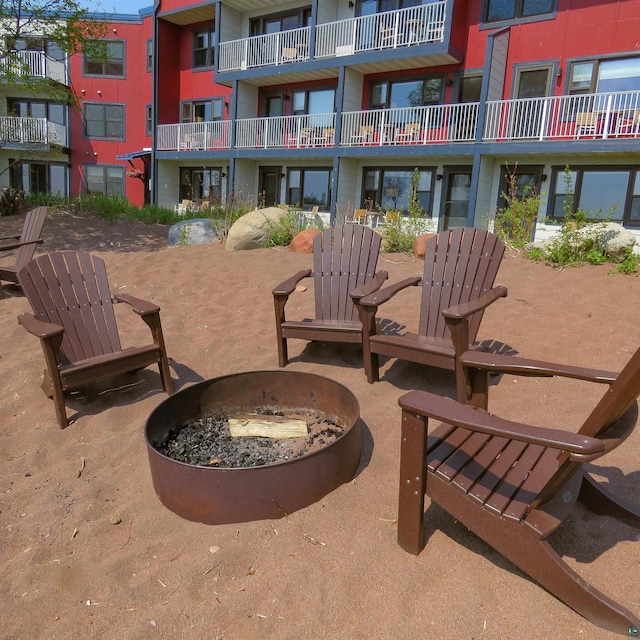 21 E Wisconsin St Unit 302, Grand Marais, MN 55604 - view of patio with a fire pit