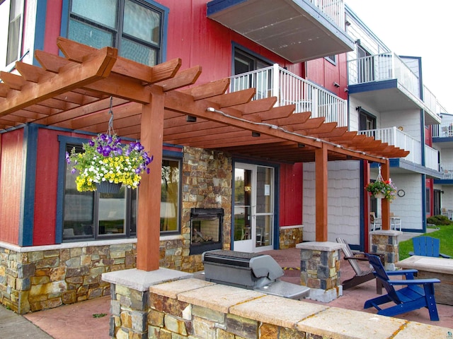 21 E Wisconsin St Unit 302, Grand Marais, MN 55604 - view of patio / terrace with a pergola