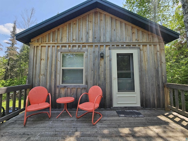 839 Loon Rd, Two Harbors, MN 55616 - deck featuring an outbuilding