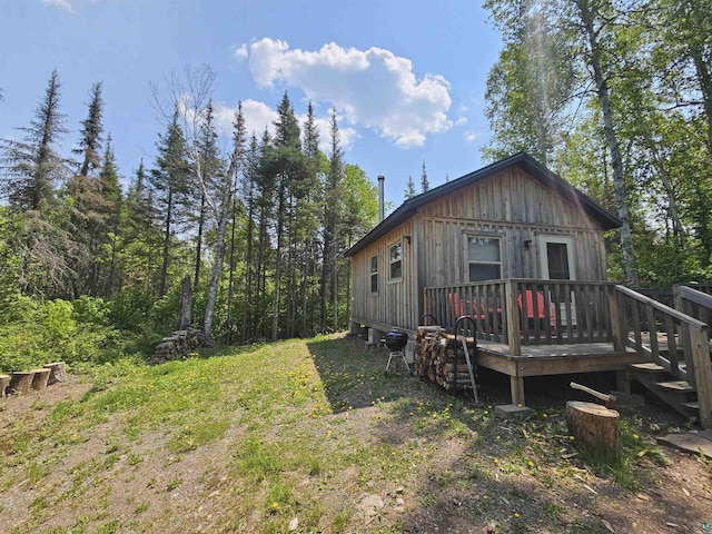 839 Loon Rd, Two Harbors, MN 55616 - rear view of house with a deck