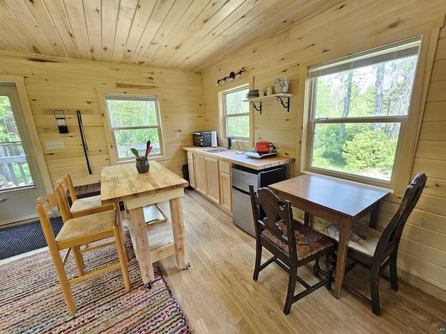 839 Loon Rd, Two Harbors, MN 55616 - dining room with light wood-style floors, wooden walls, and wood ceiling