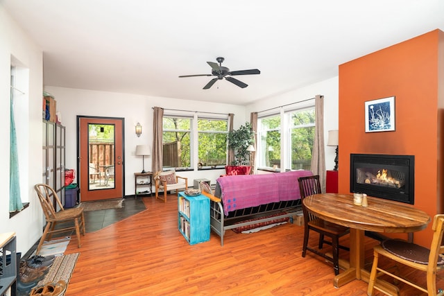 14 W 5th St Unit 1, Duluth, MN 55806 - bedroom with a glass covered fireplace and light wood finished floors