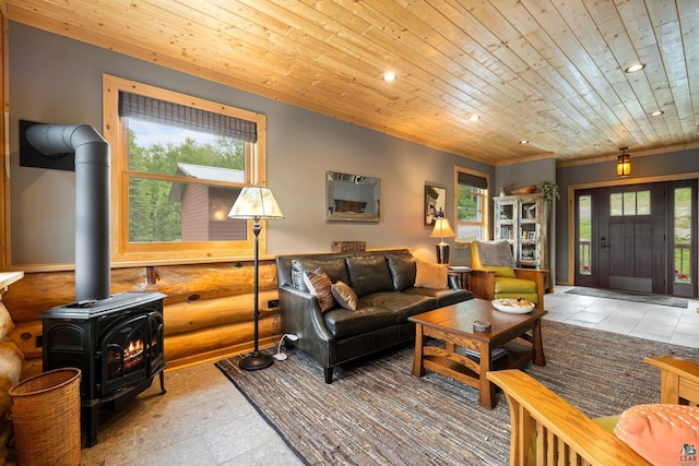 1543 E Miners Lk, Ely, MN 55731 - living area with a wood stove, healthy amount of natural light, wood ceiling, rustic walls, and recessed lighting
