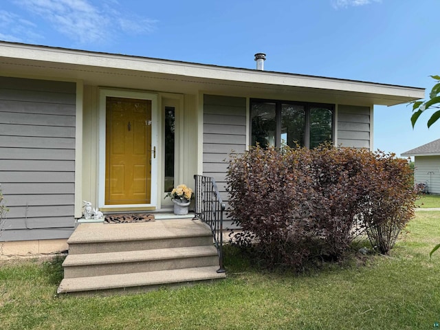11391 Briski Rd, Chisholm, MN 44719 - doorway to property with a lawn