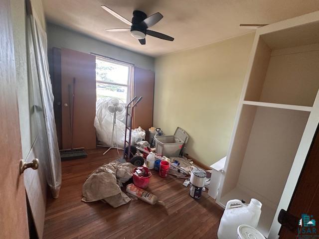 709 Summitt St, Aurora, MN 55705 - unfurnished bedroom with wood finished floors and ceiling fan