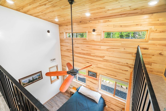1682 Old N Shore Rd, Duluth, MN 55804 - staircase featuring wooden ceiling, wooden walls, recessed lighting, plenty of natural light, and wood finished floors
