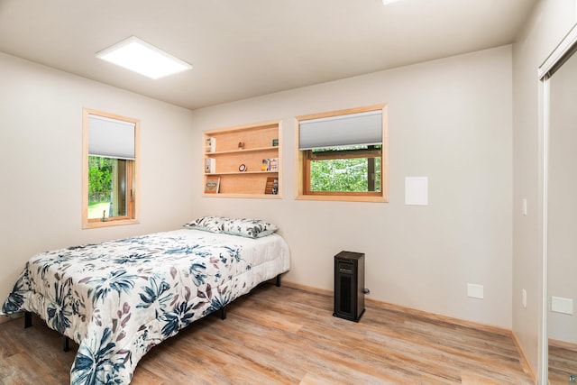 1682 Old N Shore Rd, Duluth, MN 55804 - bedroom featuring wood finished floors