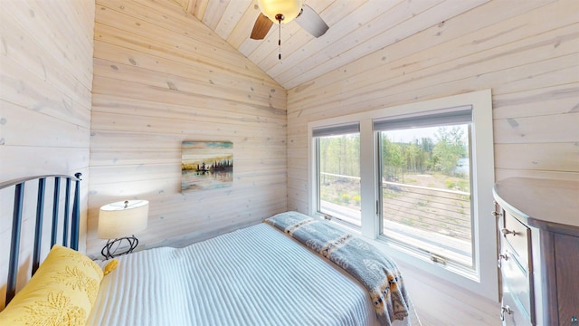 12157 Gunflint Trl, Grand Marais, MN 55604 - bedroom with wood walls, wood ceiling, access to outside, and vaulted ceiling