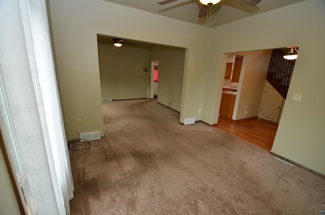 1201 N 59th Ave W, Duluth, MN 55807 - empty room with ceiling fan and light colored carpet