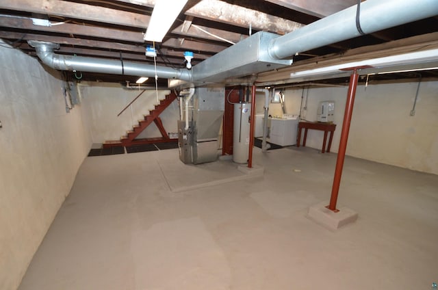 1201 N 59th Ave W, Duluth, MN 55807 - unfinished basement with water heater, heating unit, and stairs