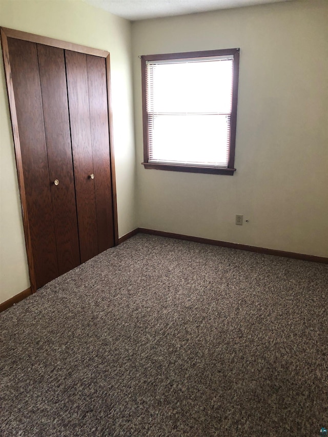 6509 Broadway St, Finlayson, MN 55735 - unfurnished bedroom with a closet and carpet floors