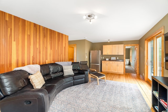 15 Big Cedar Trl, Lutsen, MN 55612 - living room with light wood finished floors and wood walls