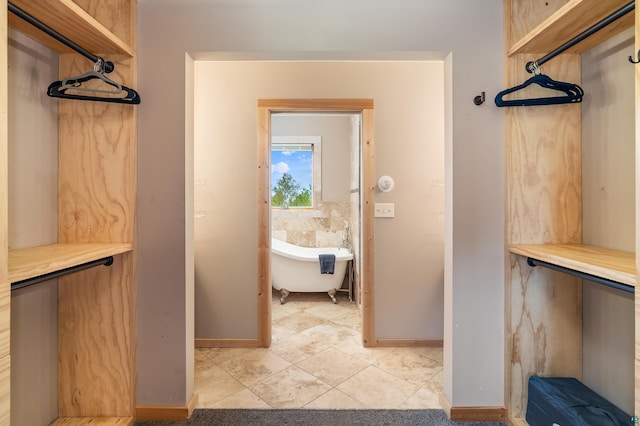 15 Big Cedar Trl, Lutsen, MN 55612 - walk in closet with light tile patterned flooring