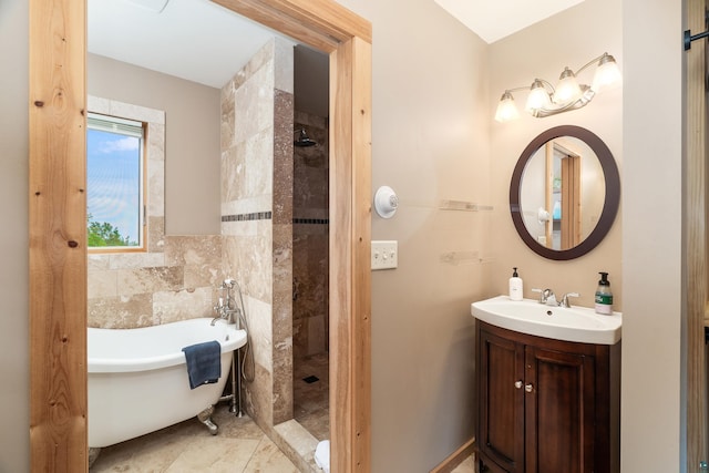 15 Big Cedar Trl, Lutsen, MN 55612 - bathroom featuring a freestanding tub, tiled shower, vanity, and tile walls