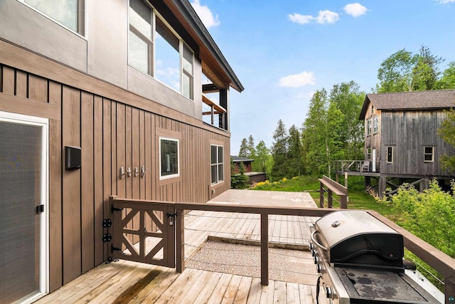 15 Big Cedar Trl, Lutsen, MN 55612 - wooden terrace with area for grilling