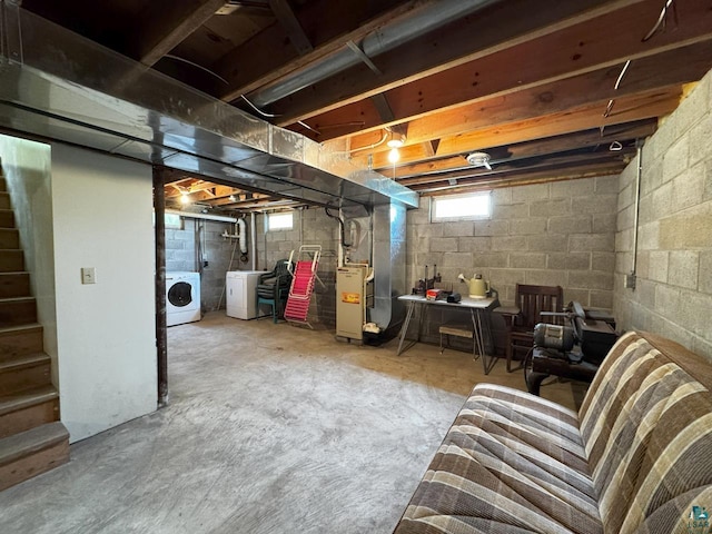3883 Pleasant Ln, Eveleth, MN 55734 - basement featuring washing machine and dryer, heating unit, and stairway