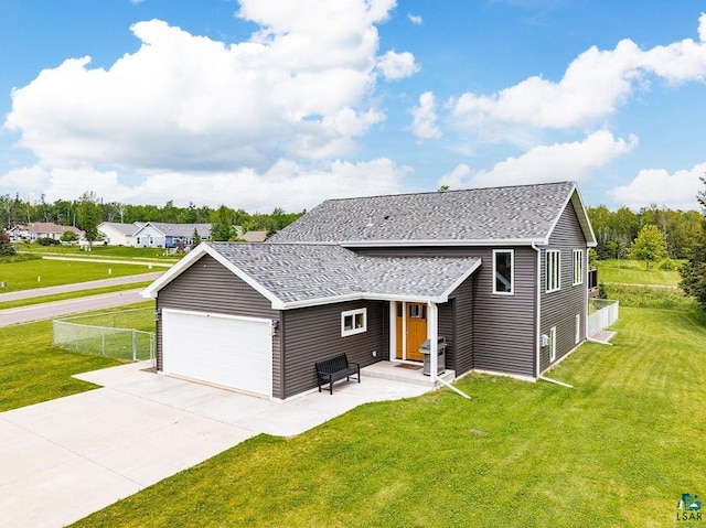 1225 Hidden Springs Ln, Two Harbors, MN 55616 - contemporary home featuring an attached garage, concrete driveway, and a shingled roof