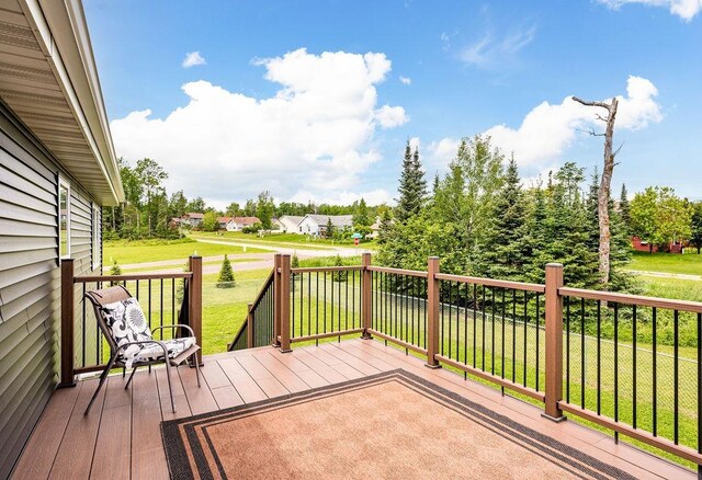 1225 Hidden Springs Ln, Two Harbors, MN 55616 - wooden terrace featuring a yard