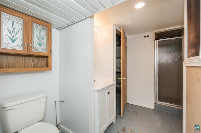 117 W Toledo St, Duluth, MN 55811 - bathroom with vanity, concrete floors, and a stall shower