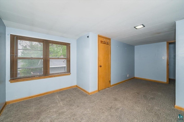 117 W Toledo St, Duluth, MN 55811 - empty room with baseboards and carpet floors