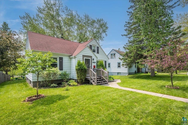4106 Gladstone St, Duluth, MN 55804 - bungalow-style home featuring a front lawn and roof with shingles