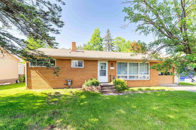 1229 W Arrowhead Rd, Duluth, MN 55804 - ranch-style house with brick siding, a chimney, a front lawn, driveway, and an attached garage