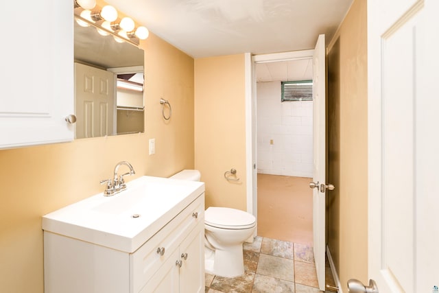 1229 W Arrowhead Rd, Duluth, MN 55804 - full bathroom featuring vanity and stone finish floors