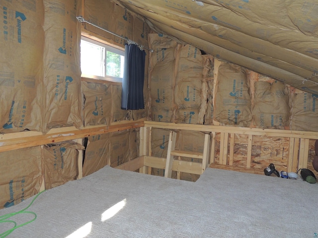 3X Skye Rdg, Grand Marais, MN 55604 - miscellaneous room featuring carpet floors and lofted ceiling