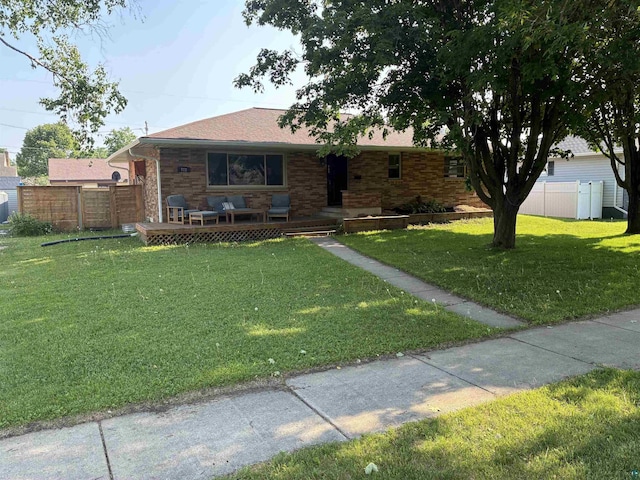 722 8th St S, Virginia, MN 55792 - ranch-style house featuring a wooden deck and a shingled roof