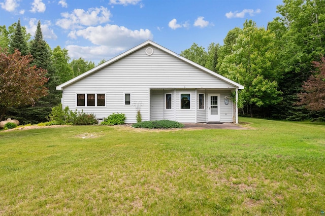 5948 Lavaque Rd, Duluth, MN 55803 - back of house with a lawn and a patio area