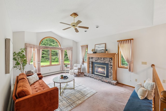 5948 Lavaque Rd, Duluth, MN 55803 - living room featuring carpet, a baseboard heating unit, ceiling fan, vaulted ceiling, and a brick fireplace