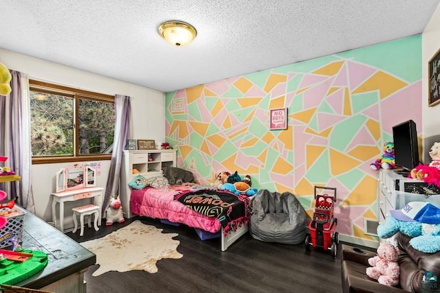 1464 Heather Ln, Cromwell, MN 55726 - bedroom featuring wood finished floors and a textured ceiling