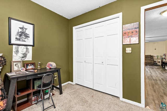 1464 Heather Ln, Cromwell, MN 55726 - office area featuring a textured ceiling and baseboards