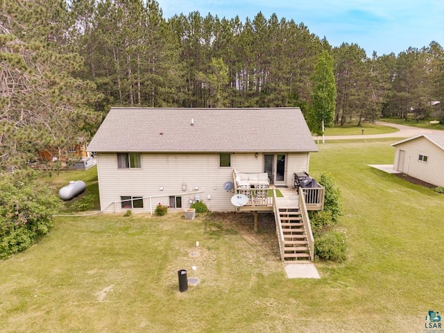 1464 Heather Ln, Cromwell, MN 55726 - rear view of house featuring stairway, a wooden deck, and a lawn
