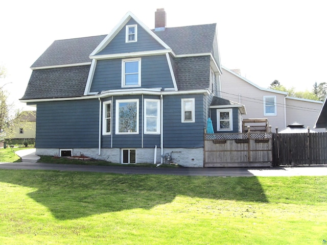 627 4th St, Proctor, MN 55810 - rear view of property with a shingled roof and a chimney